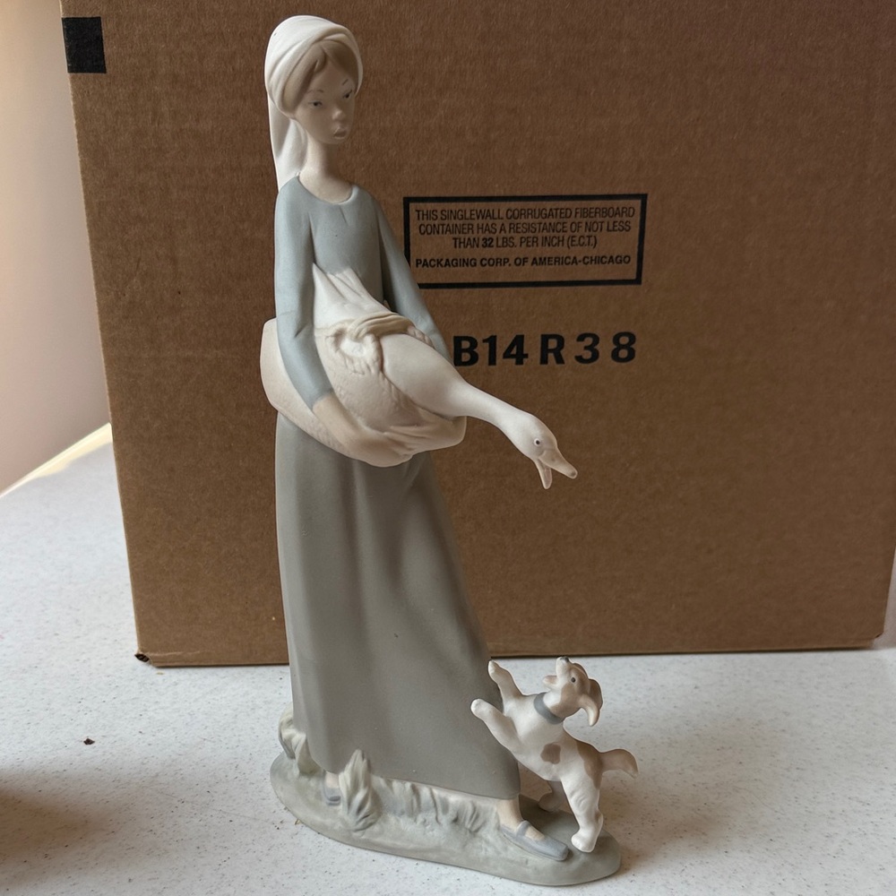 Lladro Woman with Goose and Dog Sculpture in Gray and Cream